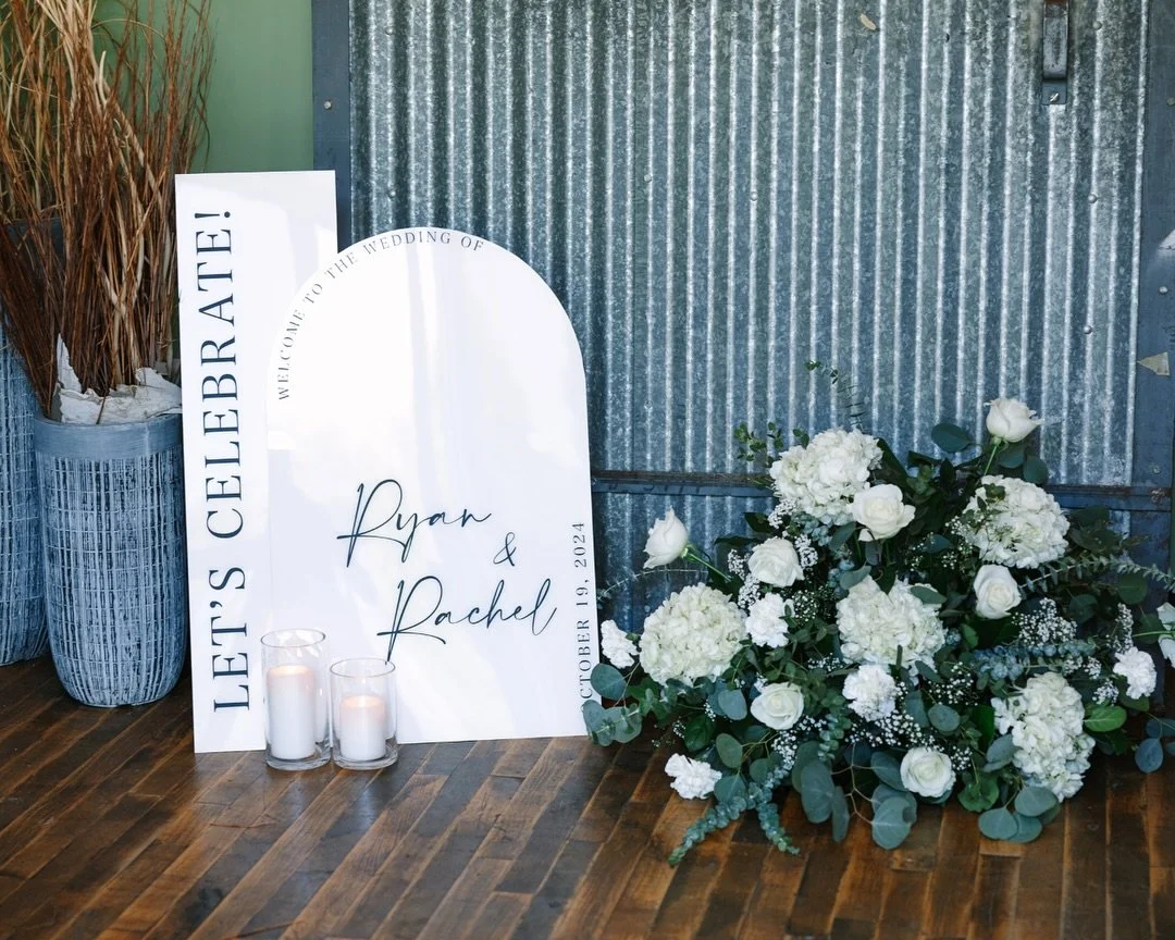 Every corner of Rachel + Ryan&rsquo;s day in the Kindel Room was a reflection of them&mdash;classic white and green florals, soft candlelight, and the sweetest personal touches (yes, those are their pups on the napkins 🐾).

✨ Love is in the details,