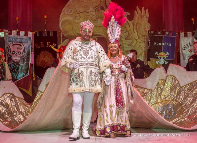King Chase Hurst & Queen Diane Eliopoulos on stage in royal costume
