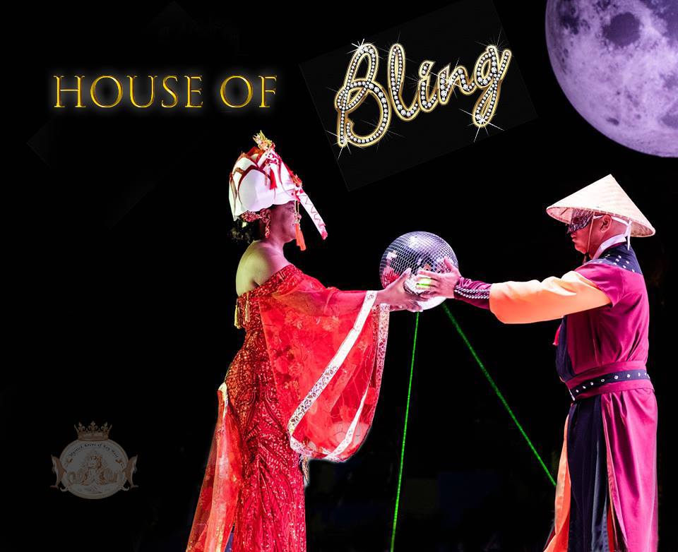 Tangela & Felix Torres in Asian costume holding disco ball