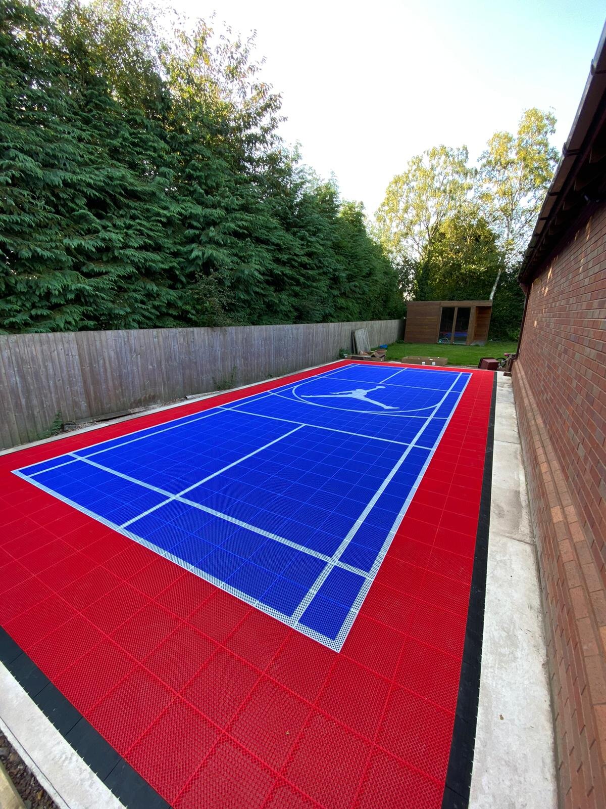 Bright red & Blue Custom badminton and basketball garden court Sport Court.jpg