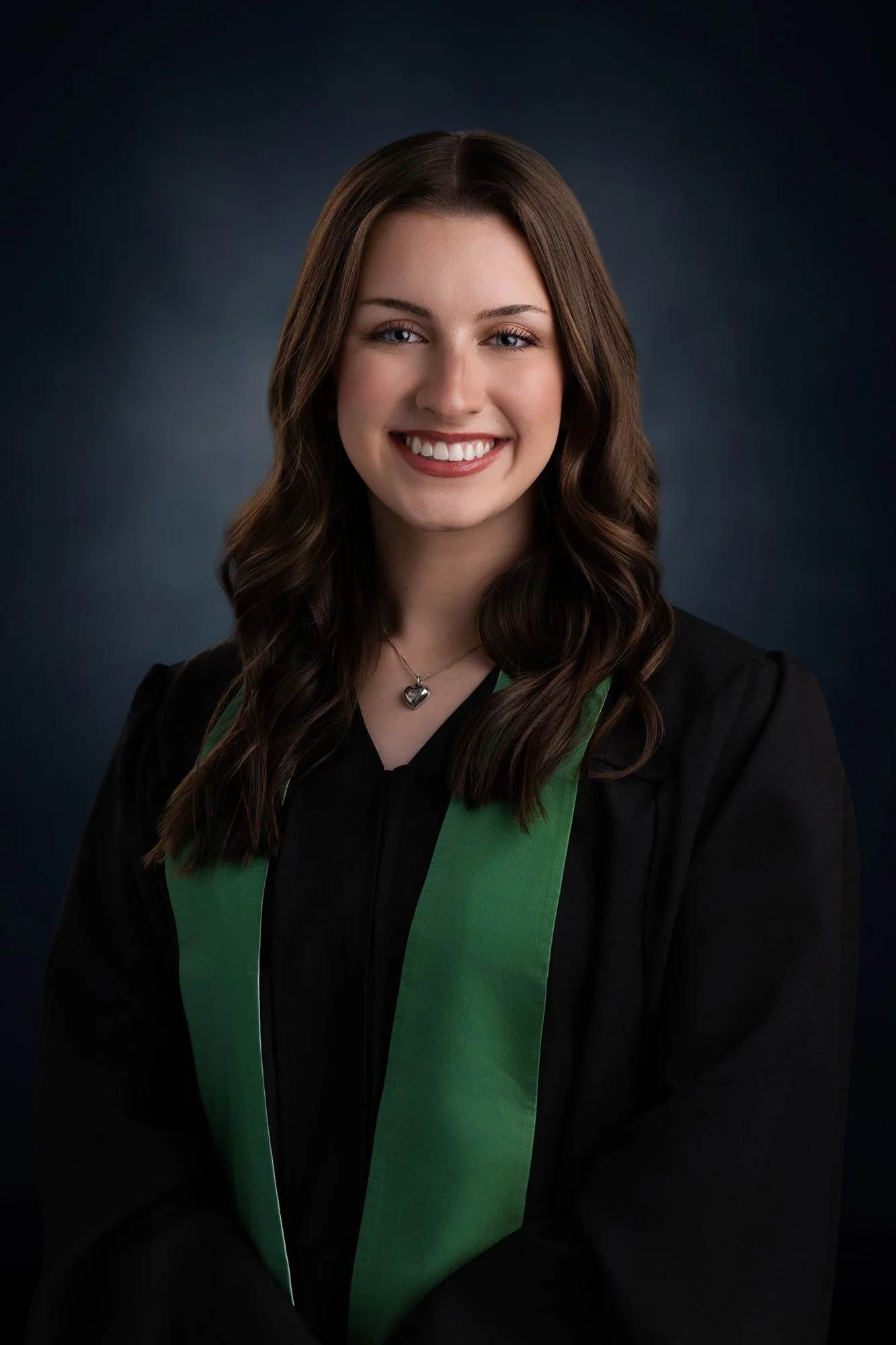 Cape Breton University Grad Photo of a young lady graduating with a Diploma in Engineering.