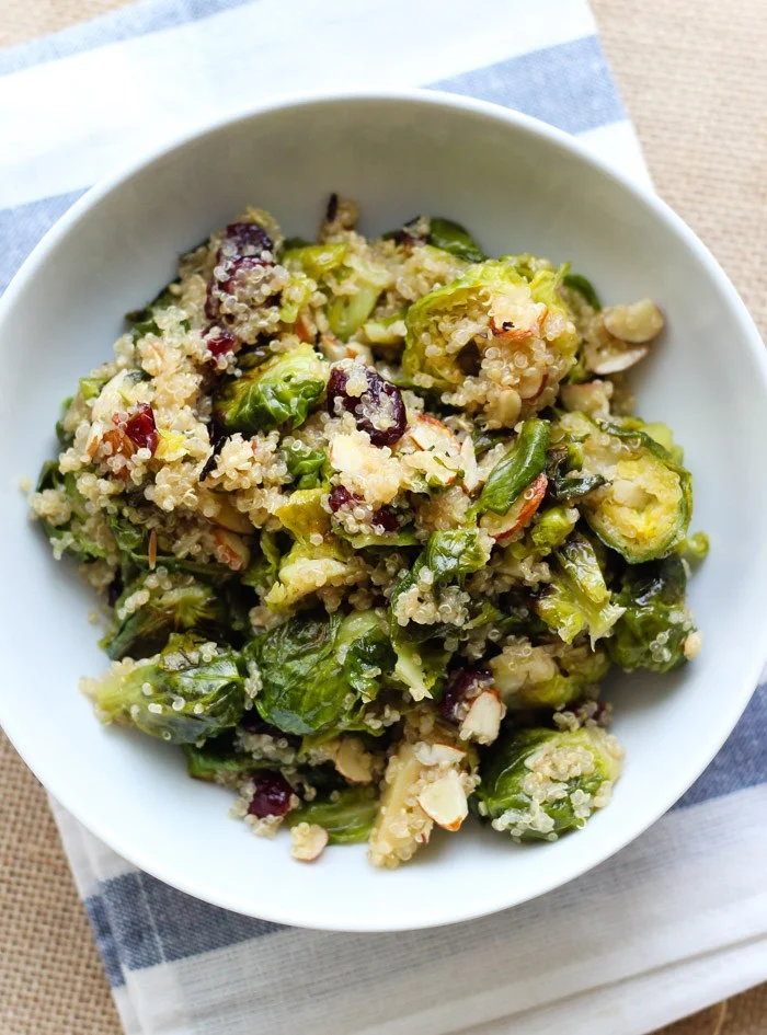 Maple-Roasted-Brussel-Sprout-Salad-with-Quinoa-Dried-Cranberries-and-Slivered-Almonds-on-theyoopergirl.com-3.jpg