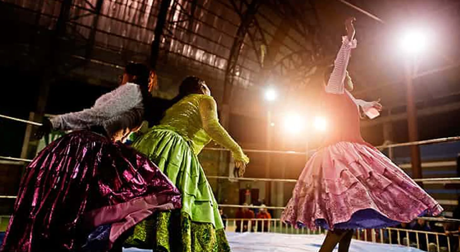 CHOLITAS - the guardian Yolanda La Amarosa flies through the air in a swirl of gold lamé and petticoats, her calves clamped around the throat of her opponent. He spins across the ring to land in a sprawl on the canvas, hand pressed against his lower back, face set in a grimace of agony. Yolanda was one of the first indigenous female wrestlers – or cholita luchadores – in Bolivia. The cholitas have become a symbol of female empowerment in a society dominated by machismo. Multimedia piece that ran in The Guardian alongside a feature I wrote for the Saturday magazine.