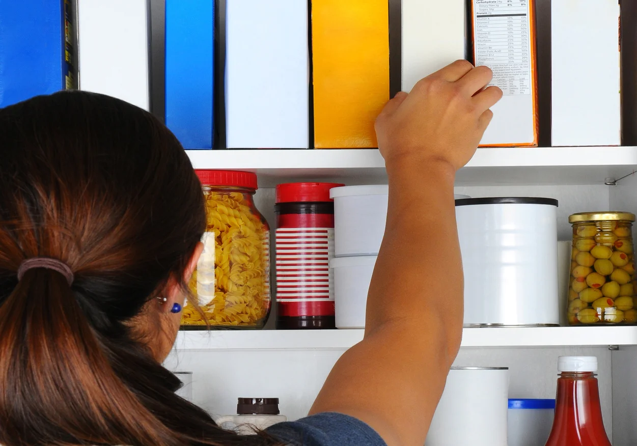 2-17-17_RTA1-Woman_Reaching_Into_Pantry_Cabinet20170227-4-18myudu.jpg