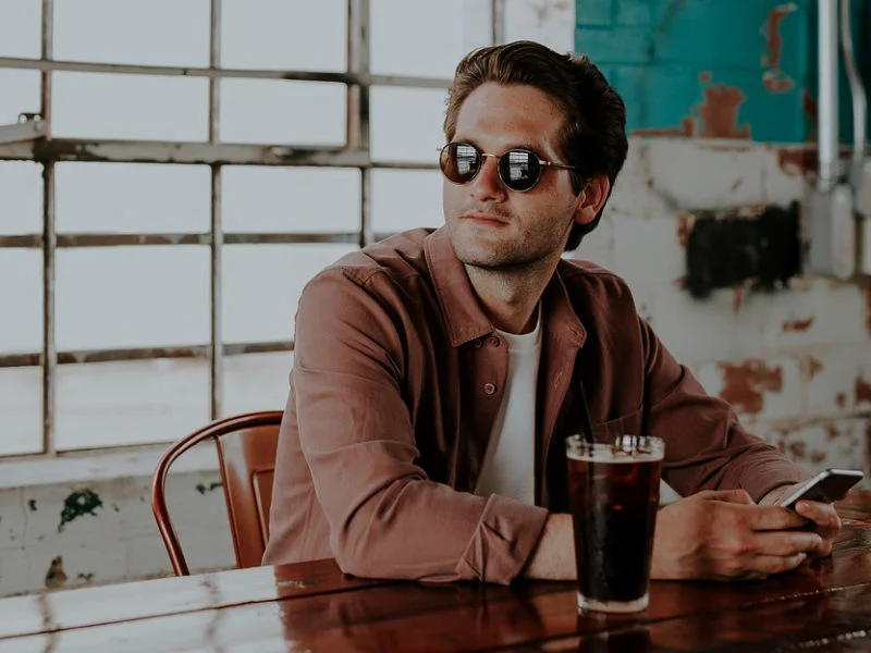 Keeping it nonchalent with sunglasses indoors.