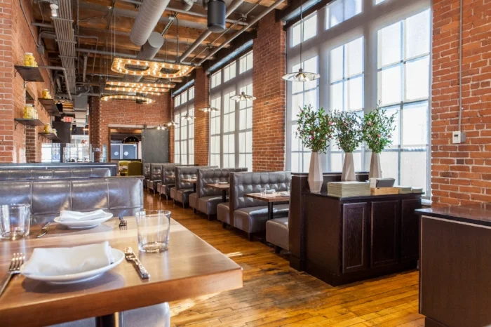 Oak + Rowan is housed in what used to be the Boston Water Company in the Seaport—marquee letters on the ceiling pay homage to the building's former resident. Photograph by Dawn Rabinowitz