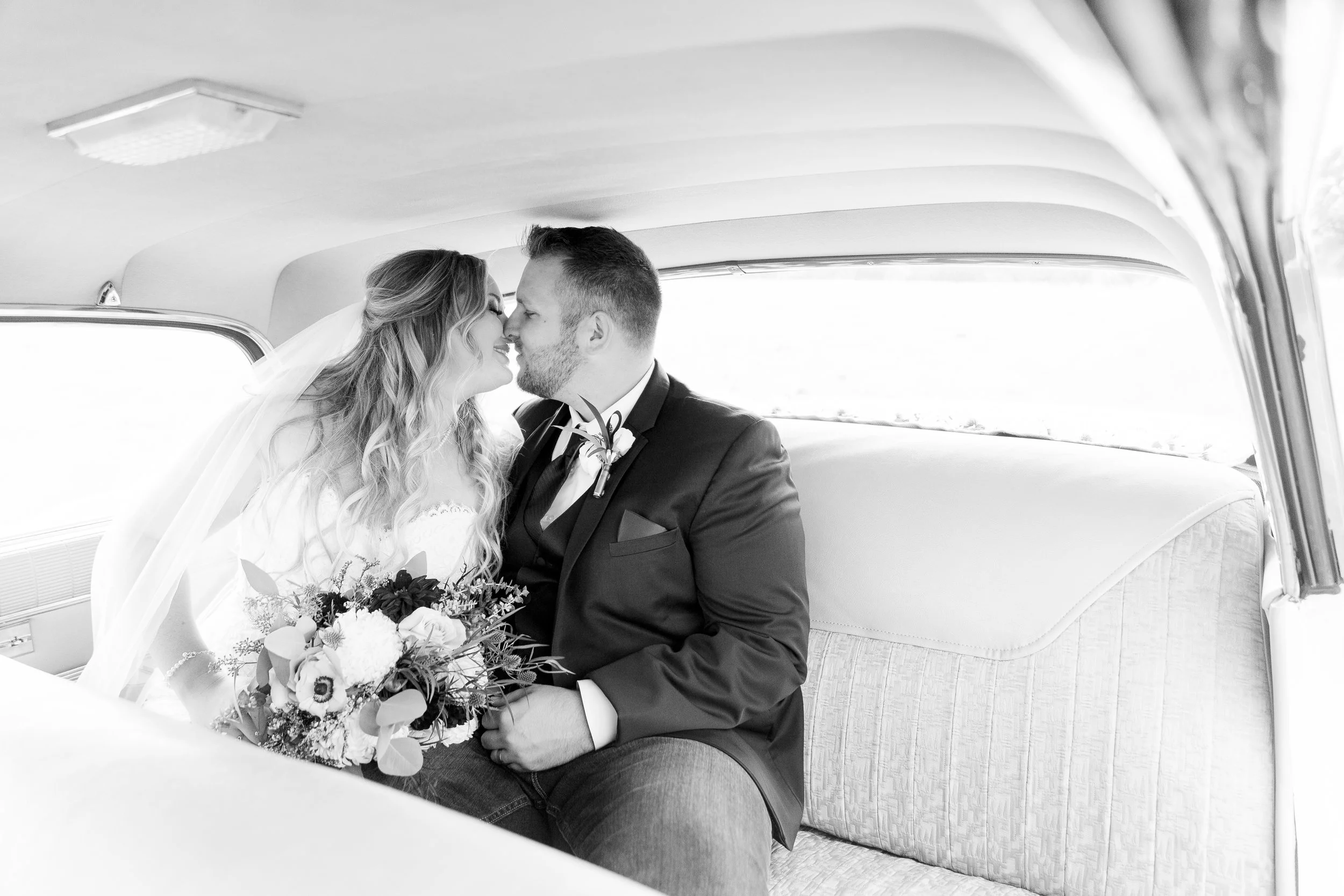 bride-and-groom-sunset-photos-in-vintage-car(184 of 220).jpg