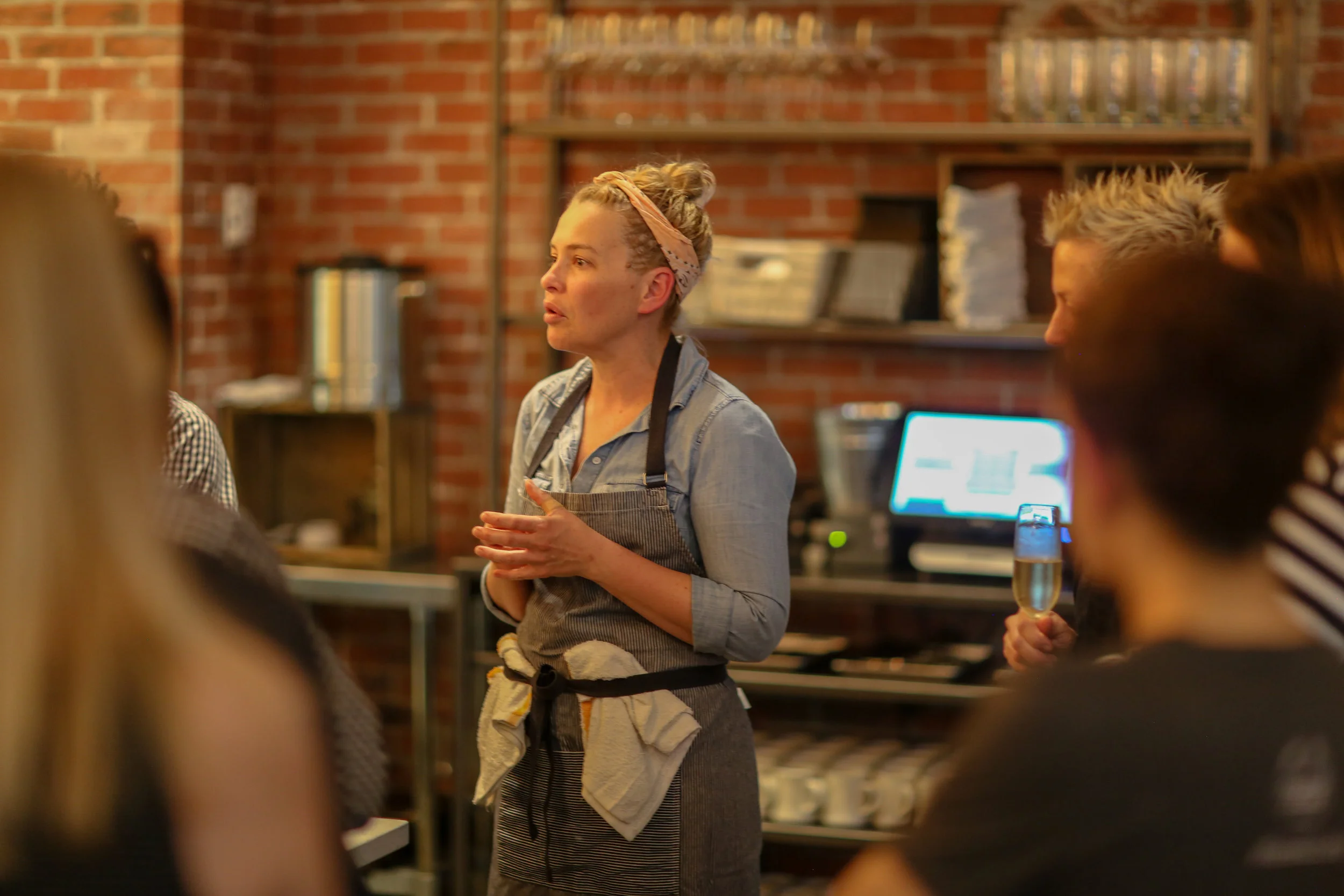 Chef Kristen Essig addressing staff.