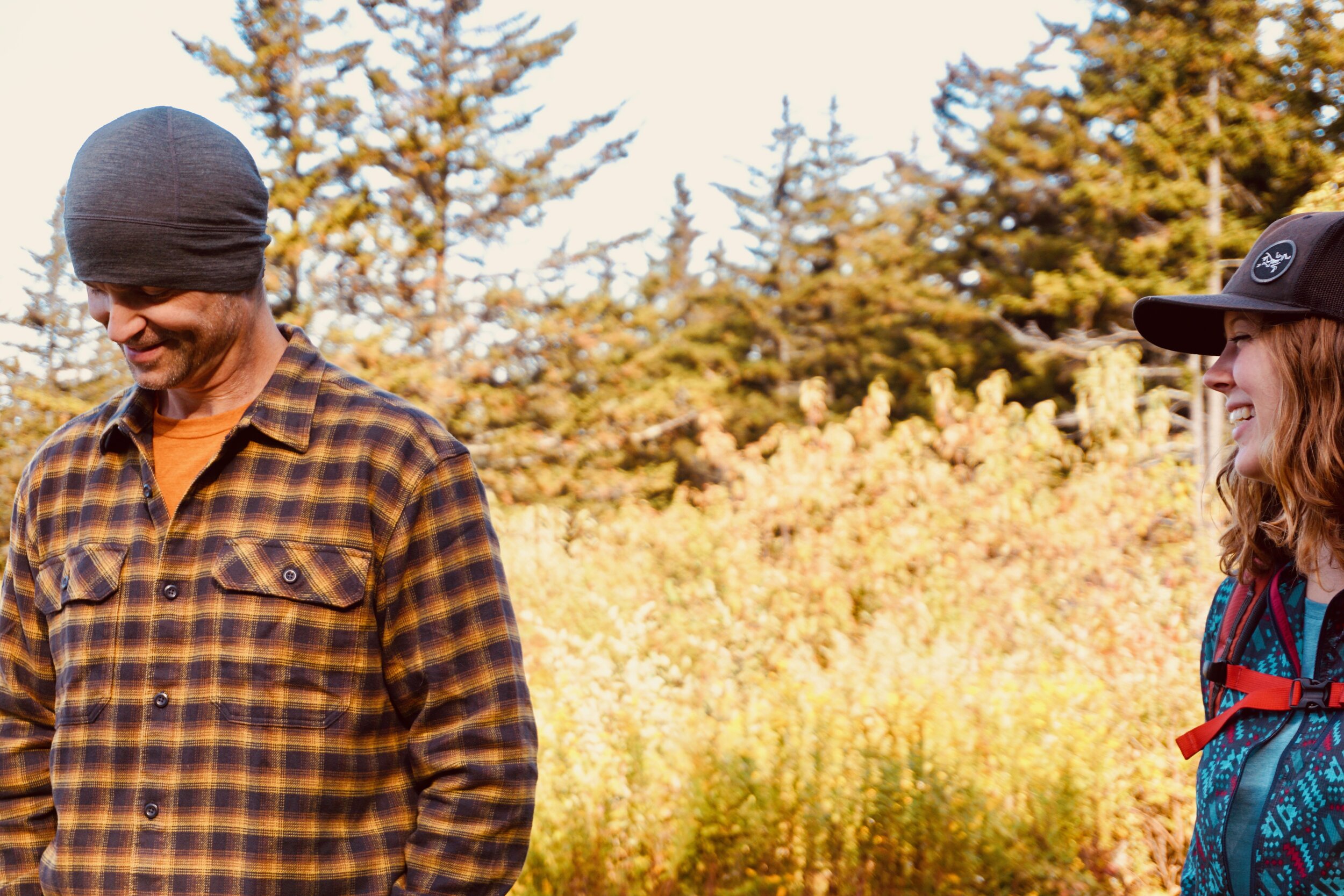 Left to Right: Men’s Patagonia Castroville:Ink Black Long Sleeve Fjord Flannel Shirt, Patagonia Gold X-Dye Long Sleeve Defend Public Lands Capilene Cool Daily Graphic (baselayer), Women’s Patagonia Icefall: Smolder Blue Houdini Jacket, Prana Vintage Blue Heather Foundation Long Sleeve Crew Neck baselayer)