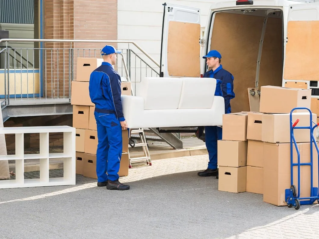 bigstock-Movers-Carrying-Sofa-Outside-T-113498615.jpg