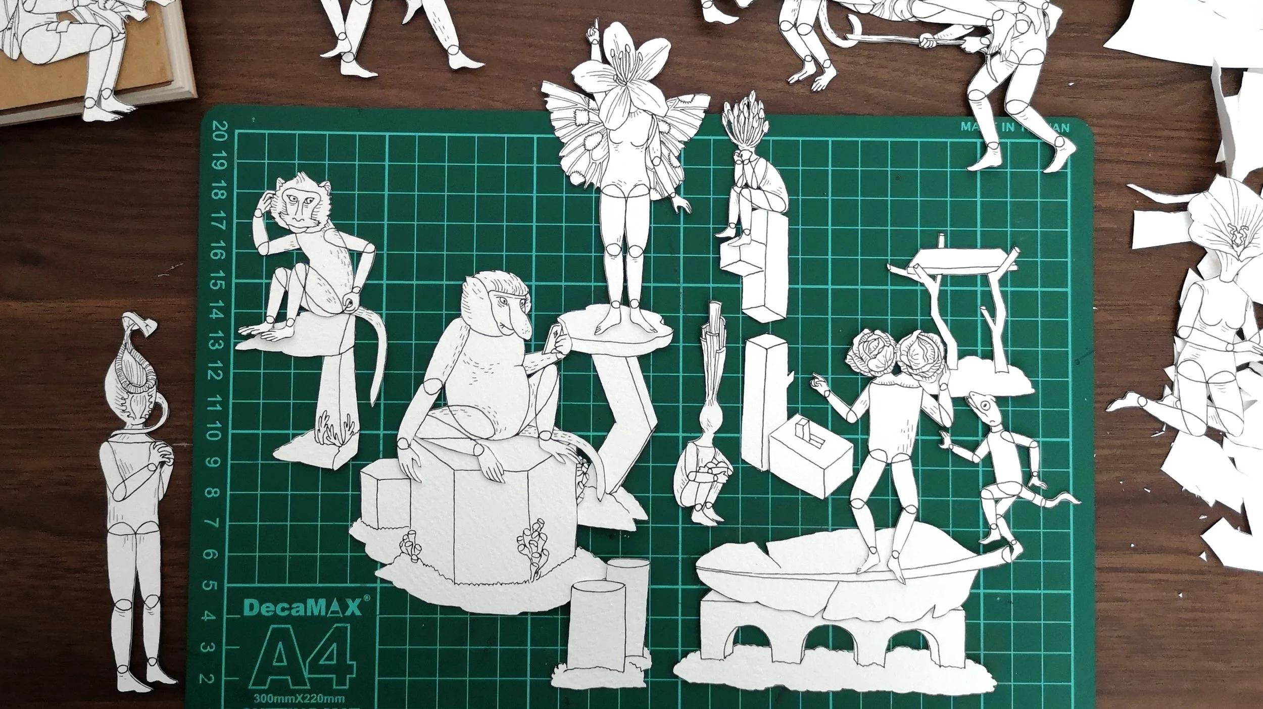 Progress shot of hybrid puppets and background objects in the Inhabitants piece.
