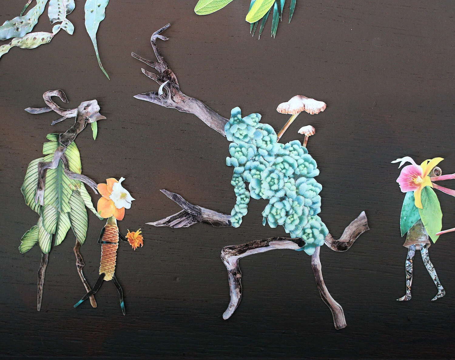 Raksasas assembled from photos of a woodpile in Kew Gardens, fleshed out with fungi and leaves from Penang.