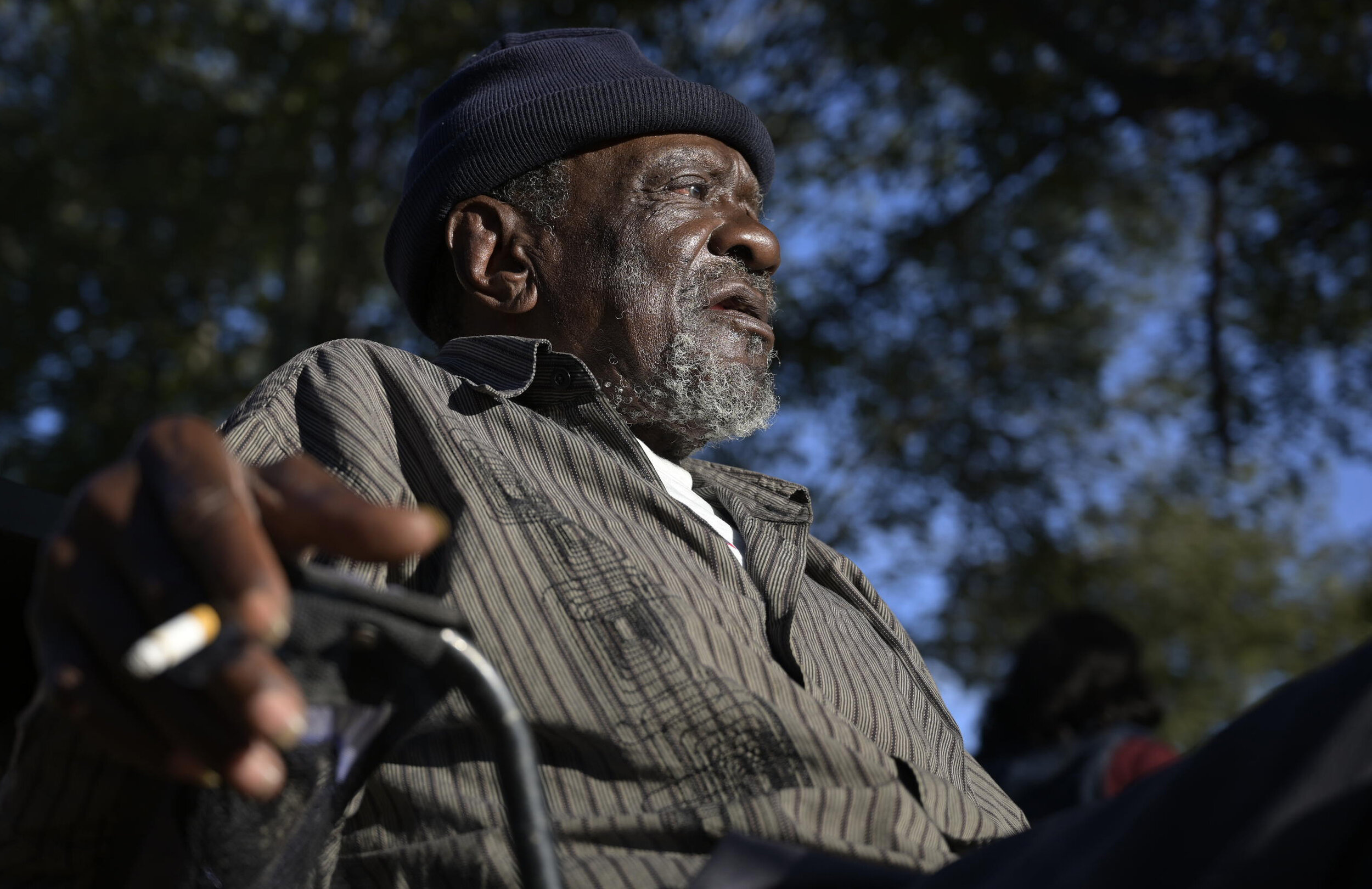  Dan Harris relaxes on a Ruleville, Miss., street corner with some neighborhood friends after a long day. "I grew up around these parts, and I left for a long time in my life, but I came back for the end to spend time in this land with these people,"