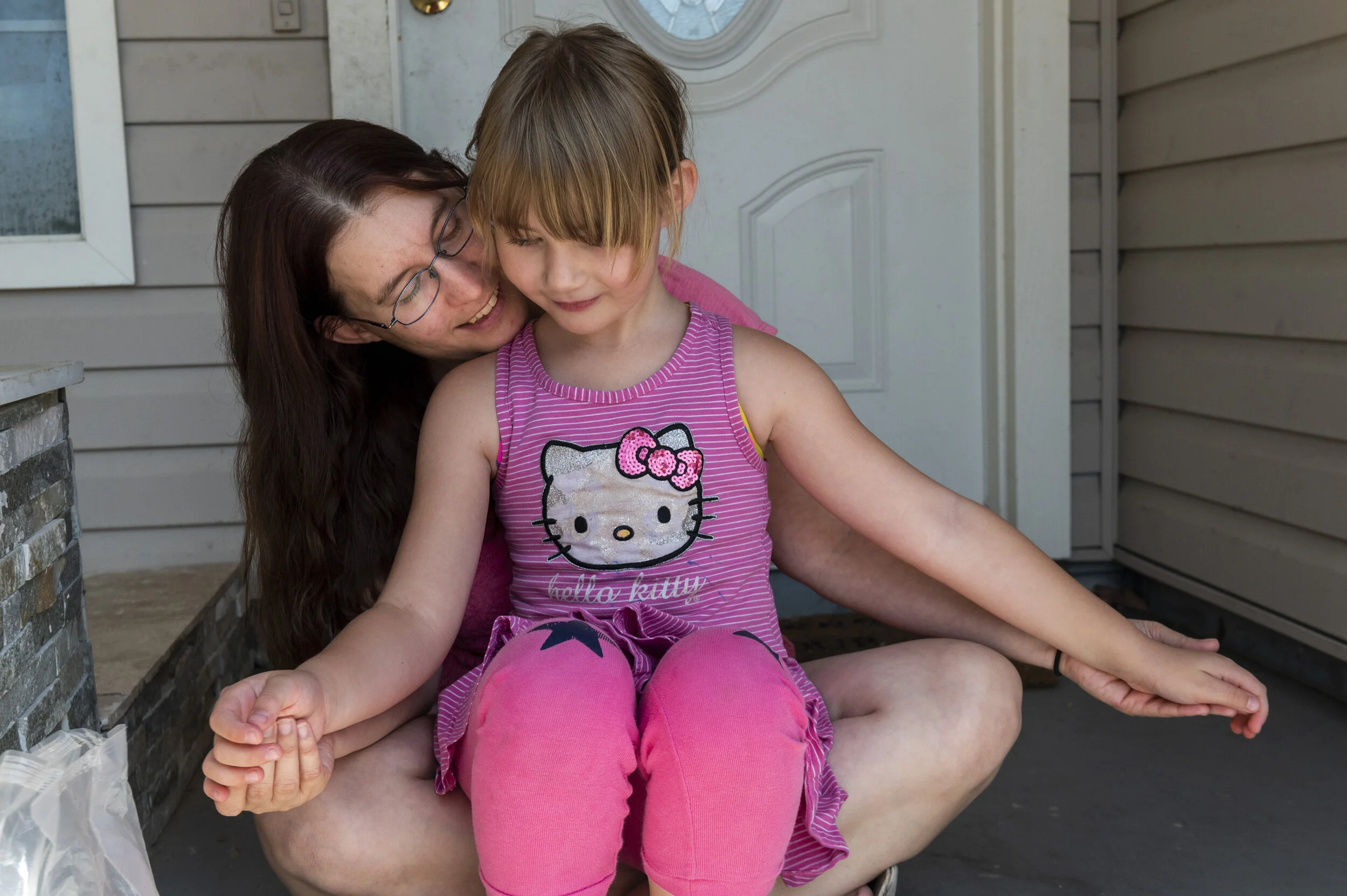  Crystal Harris, single mother of three, stays at home on disability after have surgery. She sends her youngest two kids, Alexander, 8, and Lilly, 7, to the North Highlands Community Center the block over for teaching pods in order to complete their 