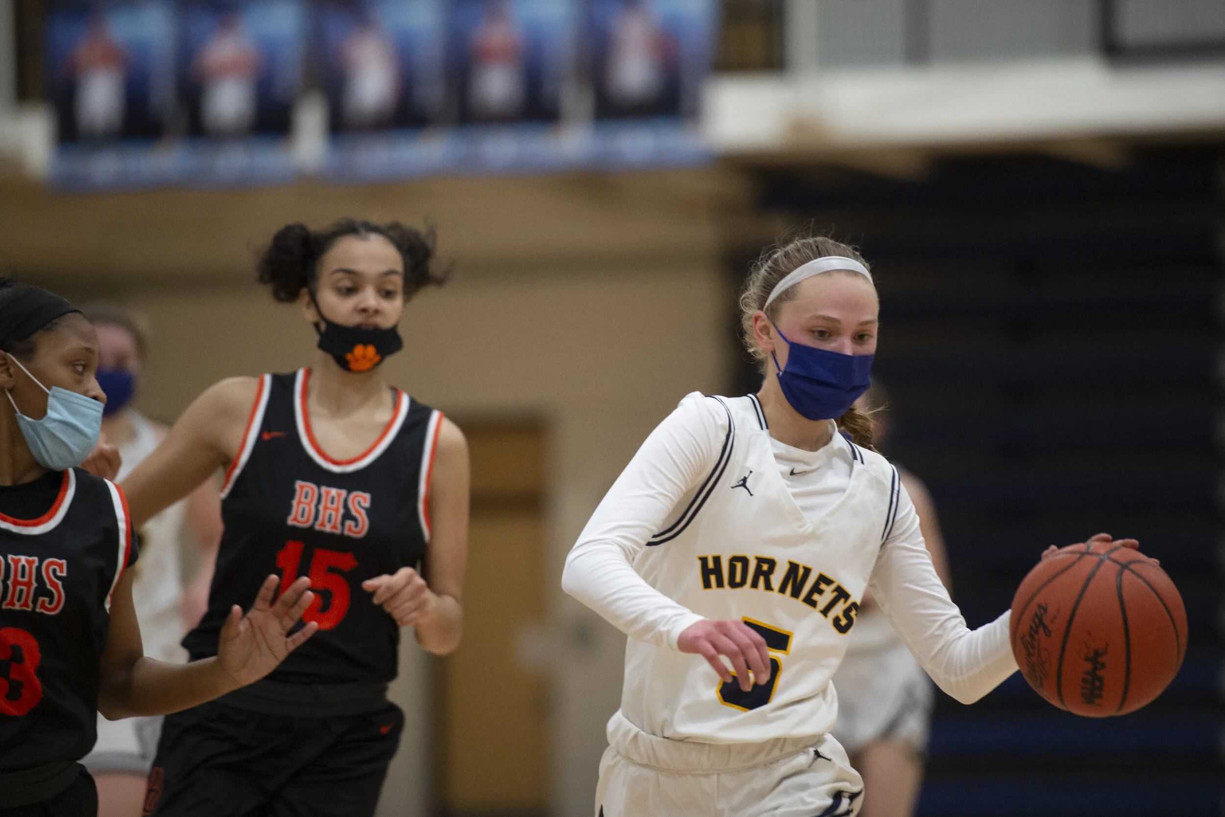  Kate (5) drives the ball down the court against Belleville at Saline during the district championship game. 