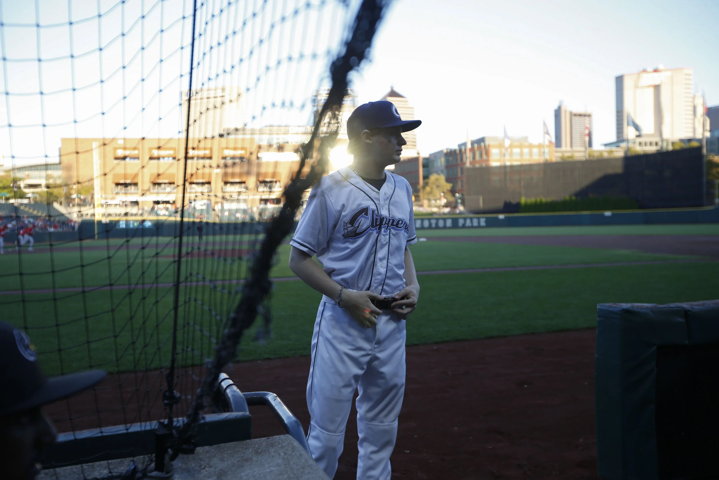  Ball boy Jackson DeWolfe gets ready for players to take the field in between innings during Wednesday night’s minor league game against the Louisville Bats at Huntington Field in Columbus, Ohio, on Wednesday, Sept. 29, 2021. DeWolfe is a student at 