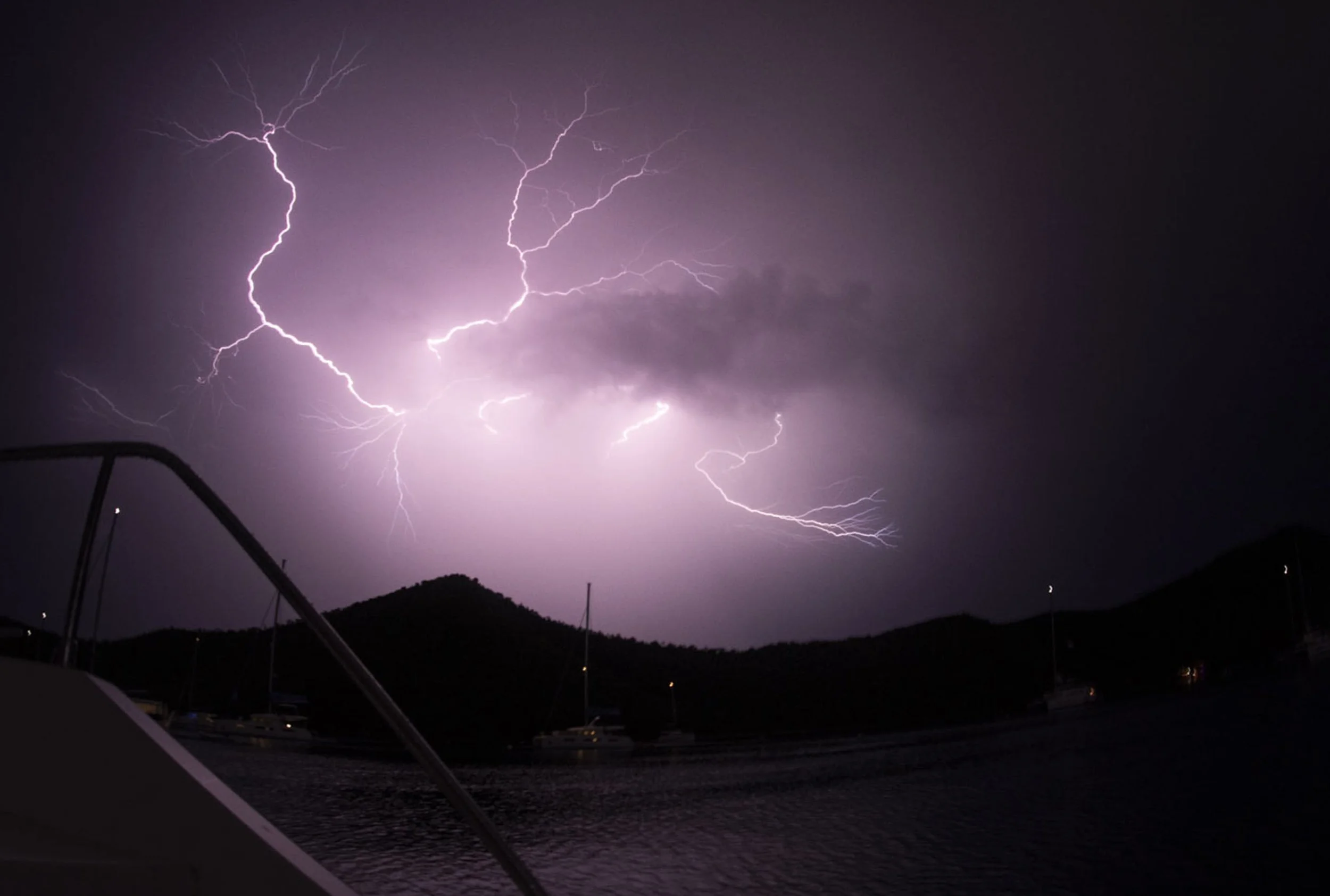  A lightning storm strikes in the bite of Norman Island in the British Virgin Islands, on Sunday, July 25, 2021. Since hurricane Irma came through the the British Virgin Islands in 2017, the citizens have been worried about the growing threat of trop