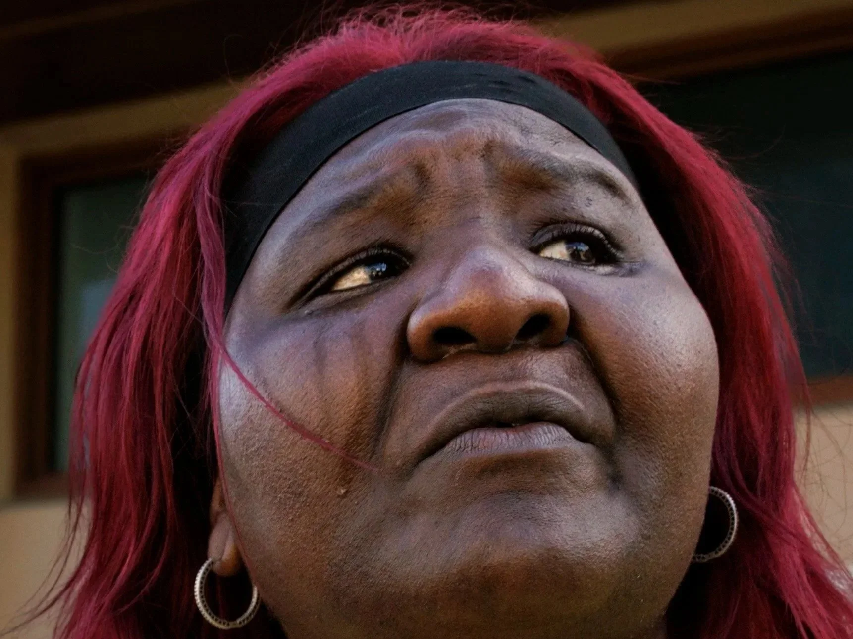 Lasonja Mills Vandyke, mother of 16-year-old Brandon Mills who was killed in a mass shooting in 2009, cries while recounting the day of her sons death on Tuesday, Aug. 27, 2024, at 15th avenue corridor, the intersection he was killed, in Liberty City