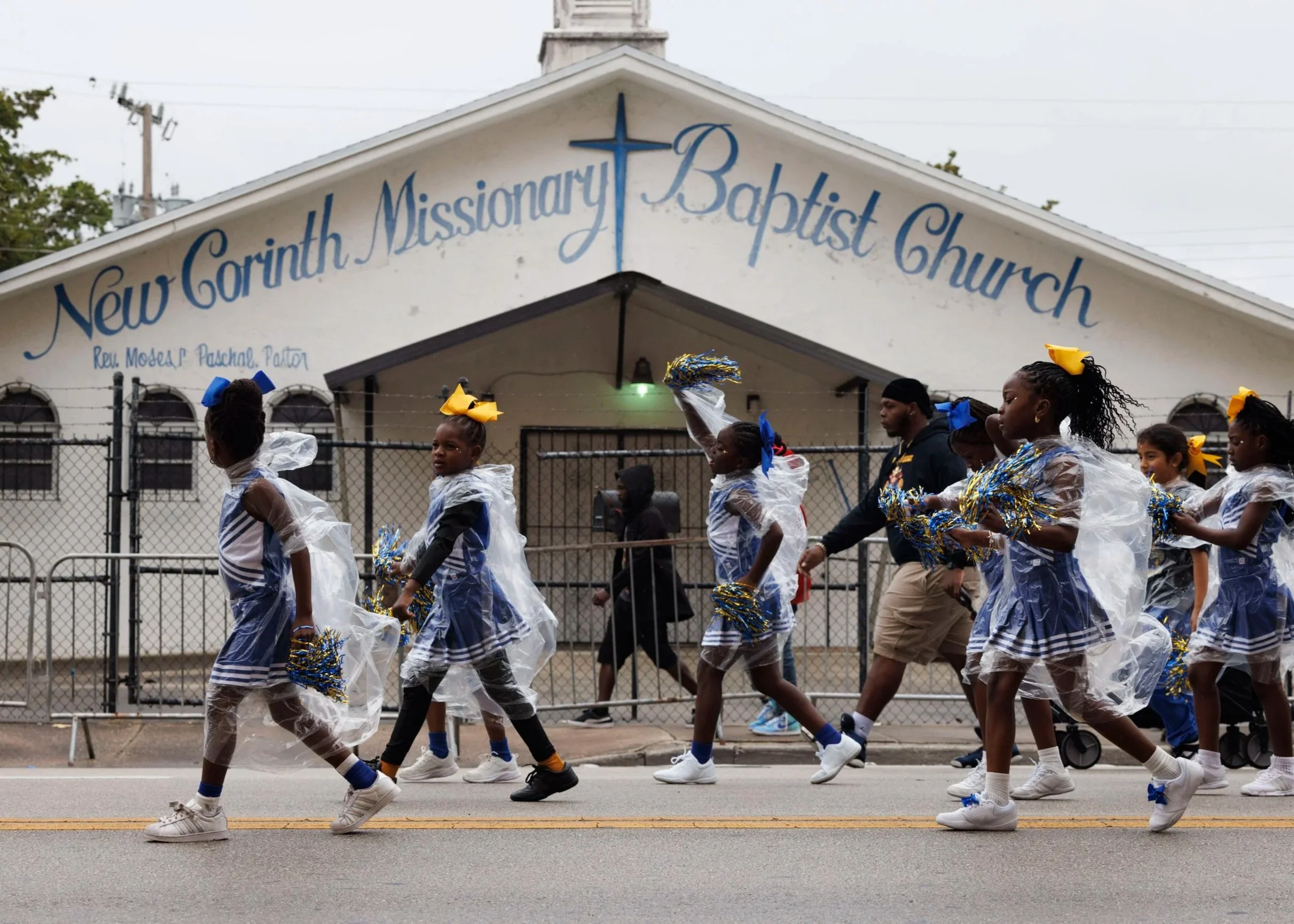 Holmes Elementary School cheer squad walks in the Dr. Martin Luther King Jr. Day parade on Monday, Jan. 20, 2025, in Liberty City in Miami, Fla.
