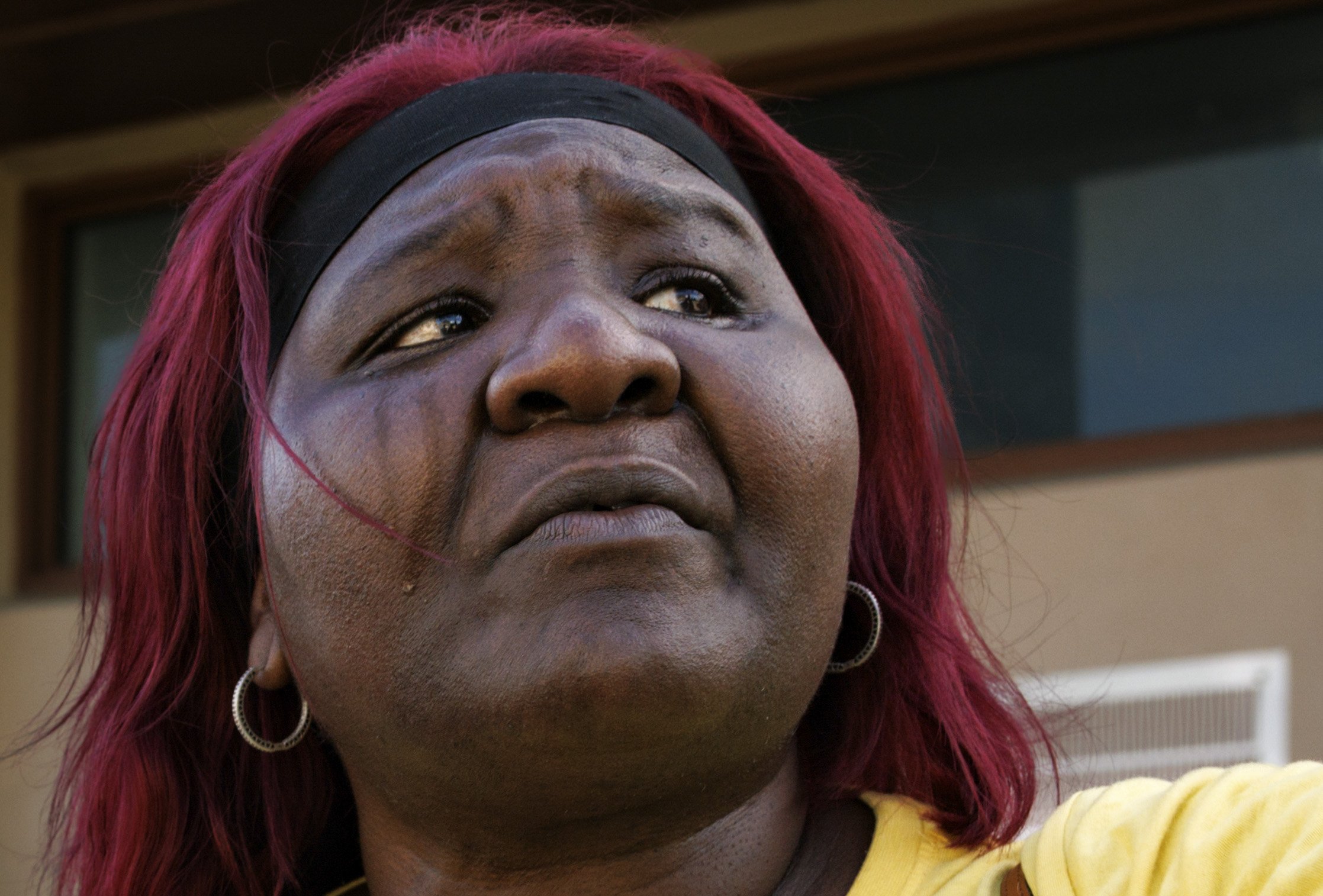 Lasonja Mills Vandyke, mother of 16-year-old Brandon Mills who was killed in a mass shooting in 2009, cries while recounting the day of her sons death on Tuesday, Aug. 27, 2024, at 15th avenue corridor, the intersection he was killed, in Liberty City