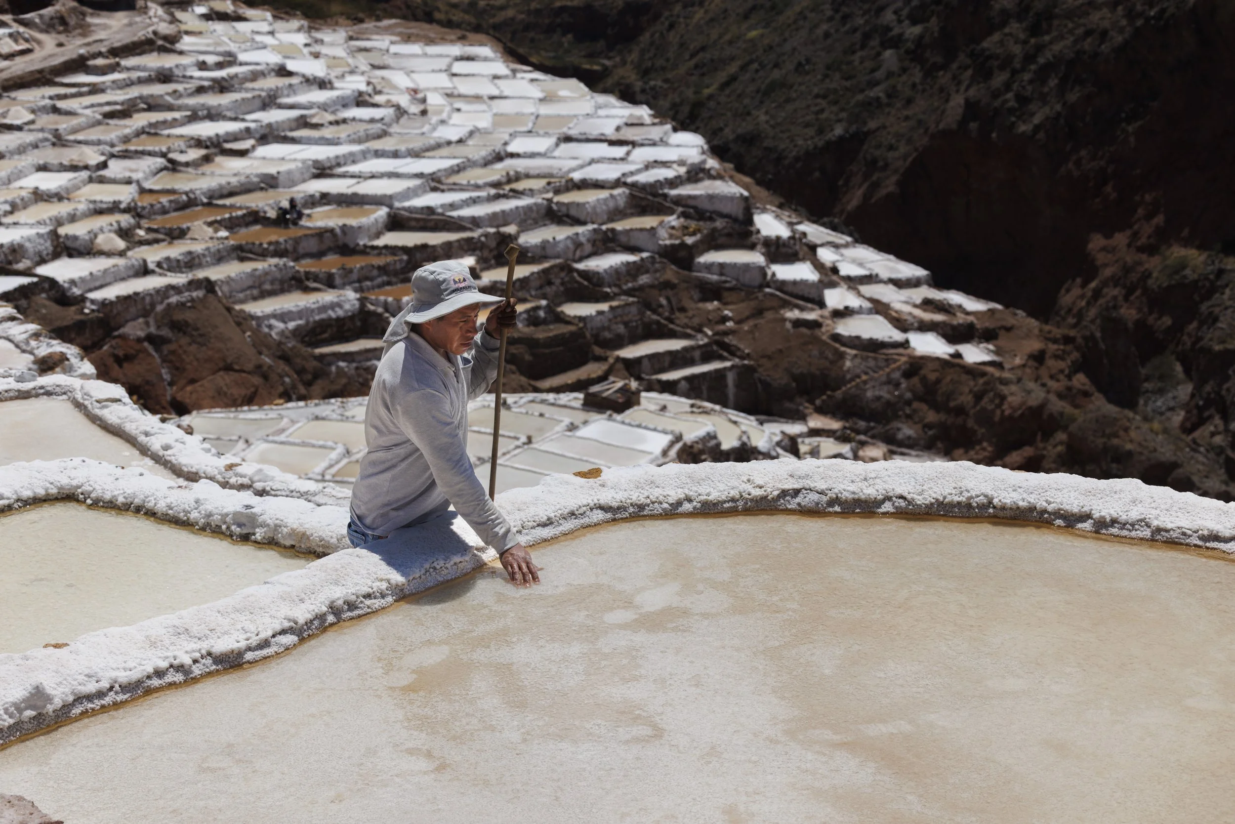 High in Peru’s Andes, villagers carry out centuries-old work of collecting salt.

Uriel inspects one of his family’s salt ponds at Salineras de Maras, Maras Salt mines, in the Sacred Valley, Peru on Sunday, Aug. 31, 2025. The salt ponds have been in 