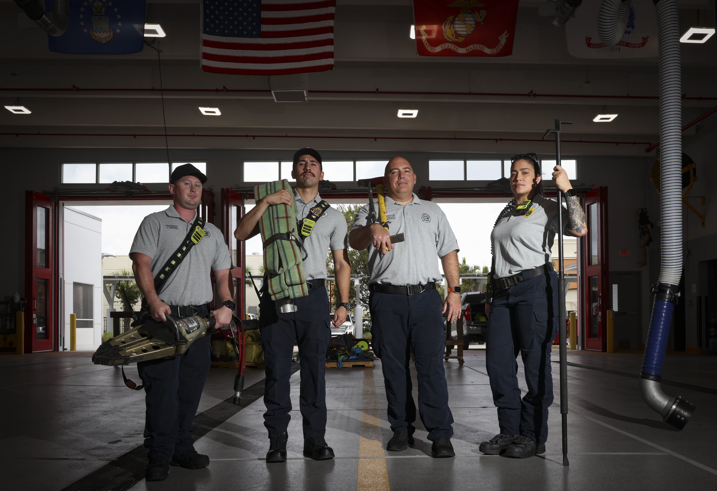 From left to right: Chris Carlson, Jared Lago, Bibich Zabaleta, and lieutenant Veronica Cordoba, the fire engine crew for Station 68, pose during a shift on Thursday, April 3, 2025, at Dolphin Station 68 in Doral, Fla. The crew works together on 24 h