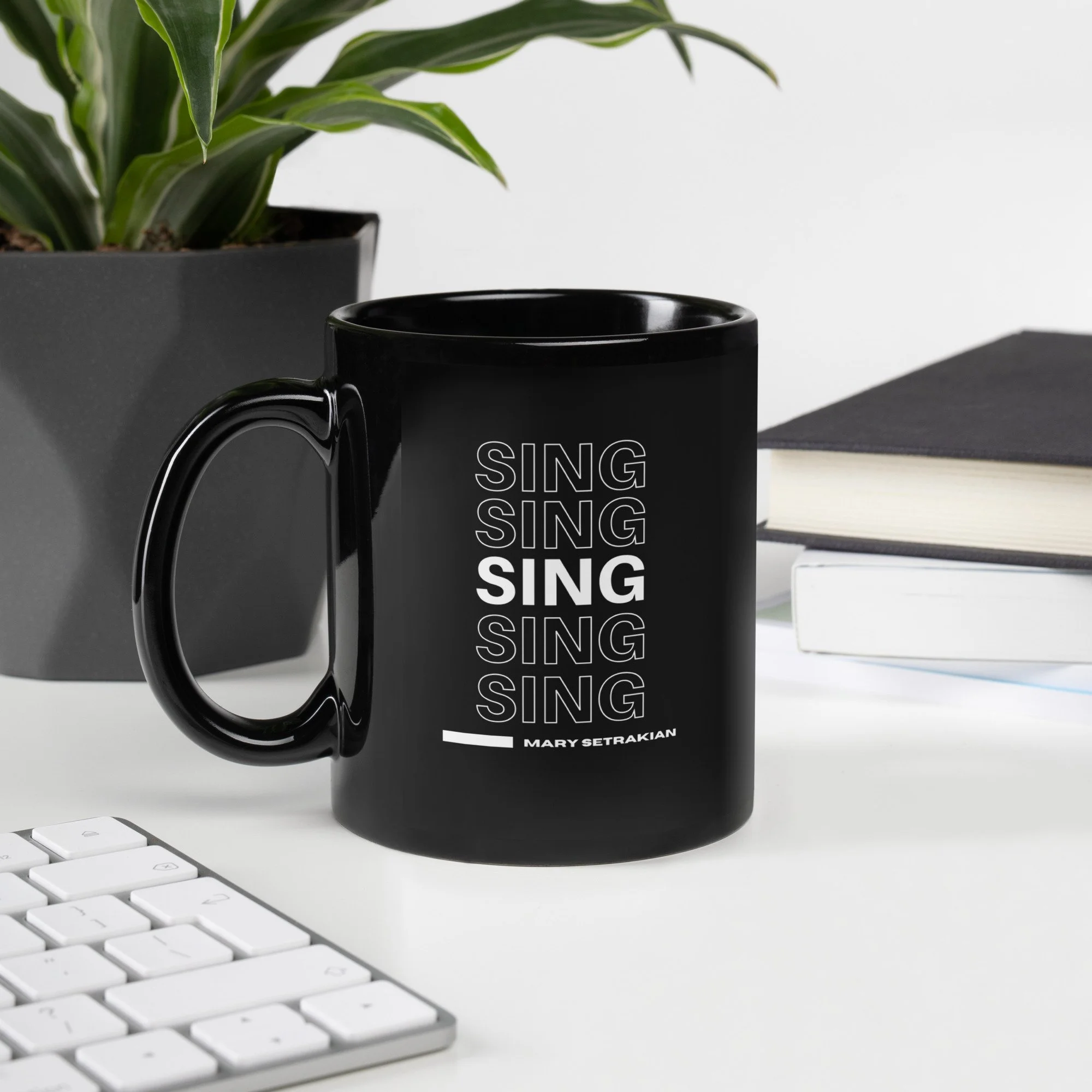 black-glossy-mug-black-11-oz-handle-on-left-6693ee7c66be9.jpg