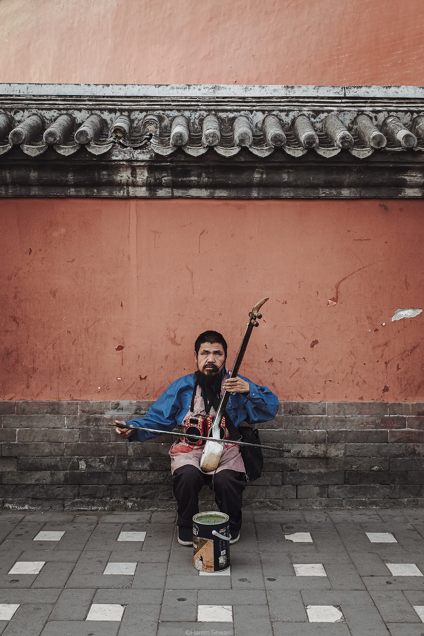 On the Mid-Autumn Festival when families get together, a blind beggar at the most lively Hutong plays the most heartbroken music for the city. Beijing, China
