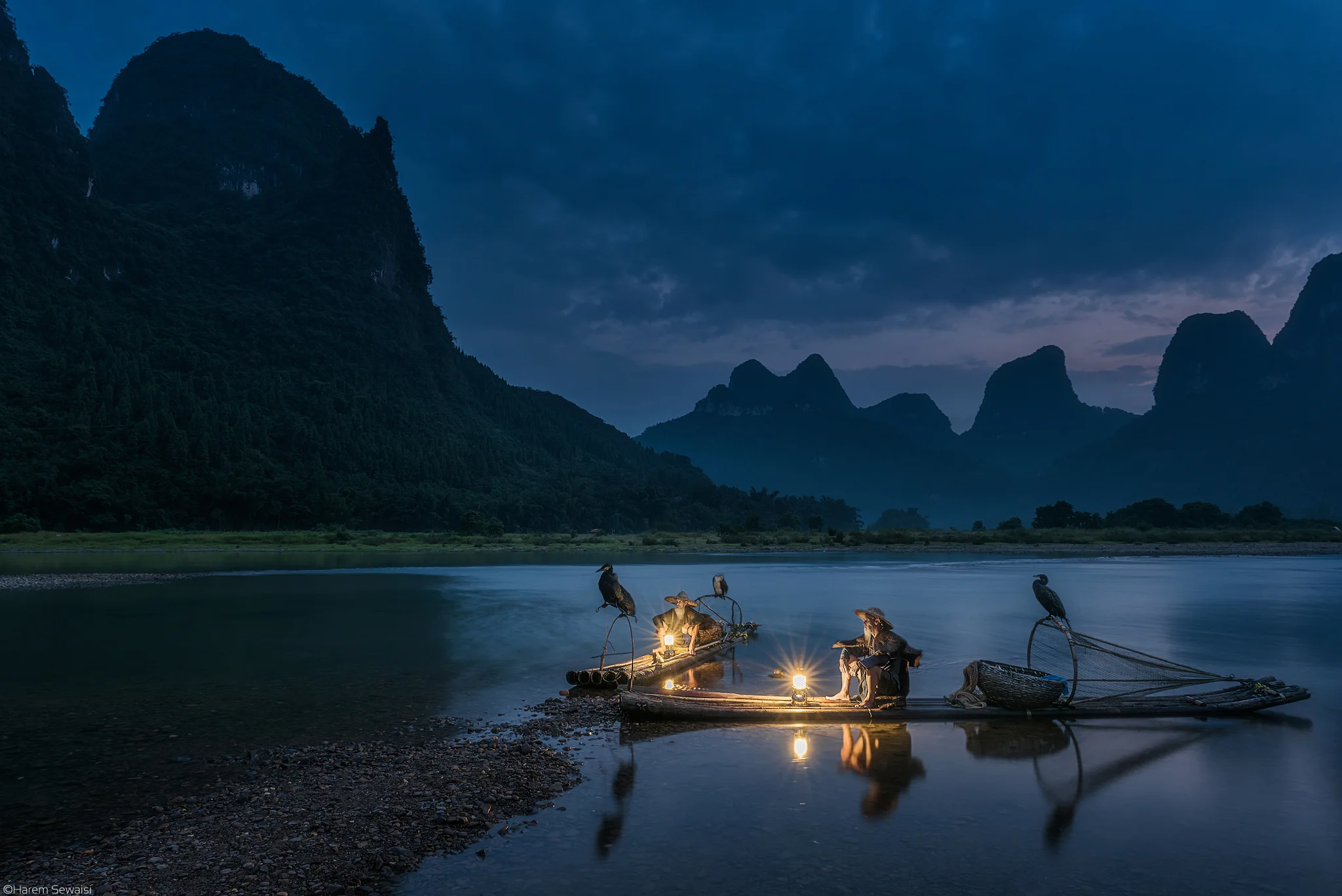 The fishermen Huang Mingde and Huang Yuechuang. Guanxi Province, China