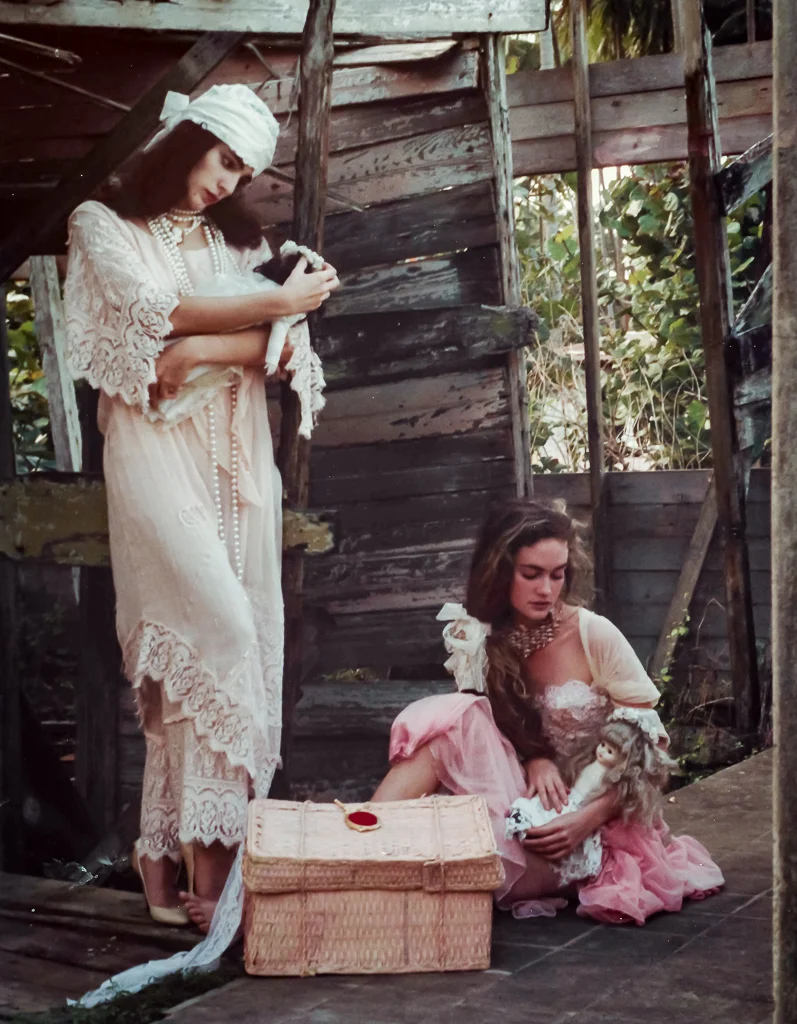 A very romantic look by designer David Antonio. Models Frances Torres and Jacqueline Franceschi were playing with old porcelain dolls in an abandoned shack. This pic is another one of my favorites. I love it's mood. 
