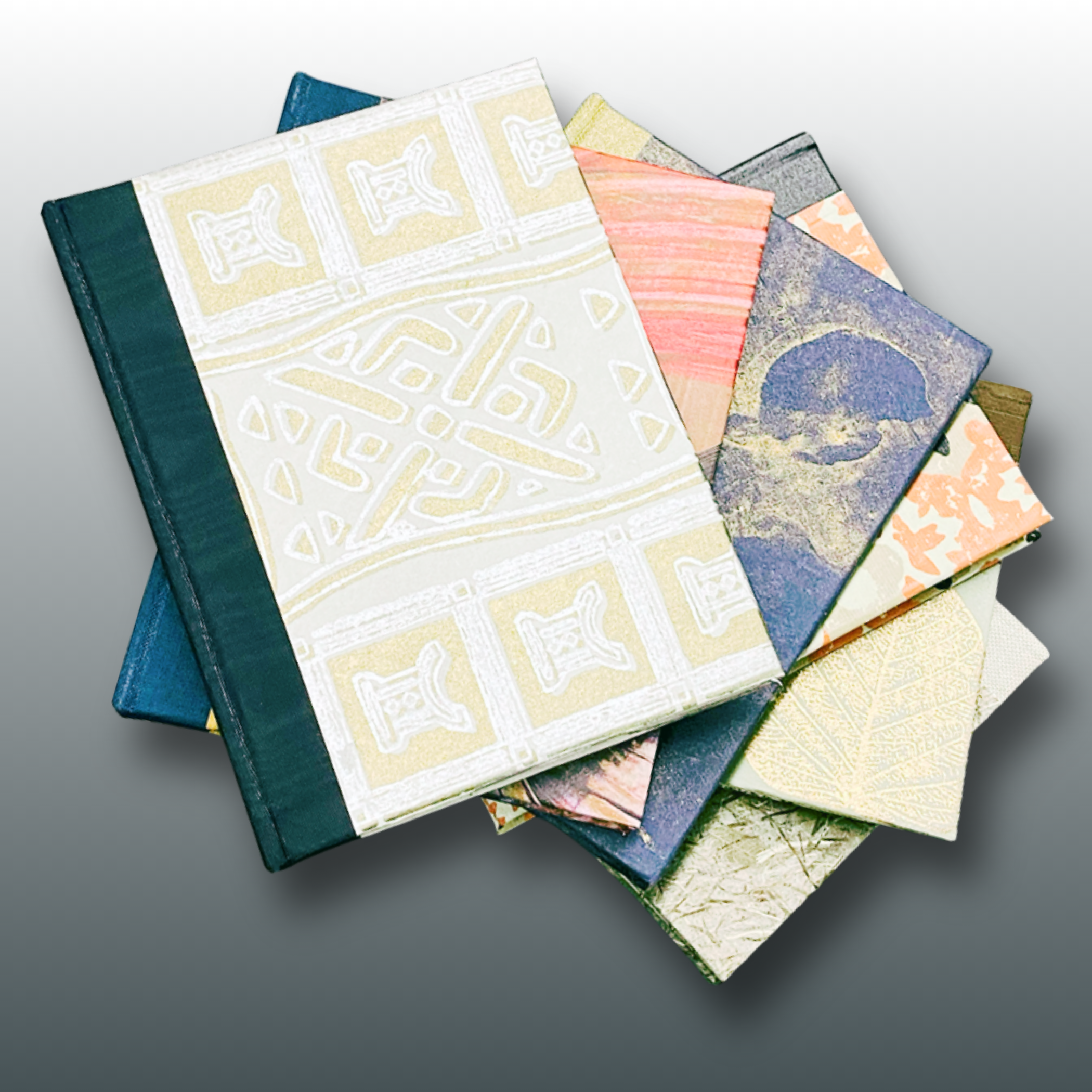 A stack casebound books with different covers