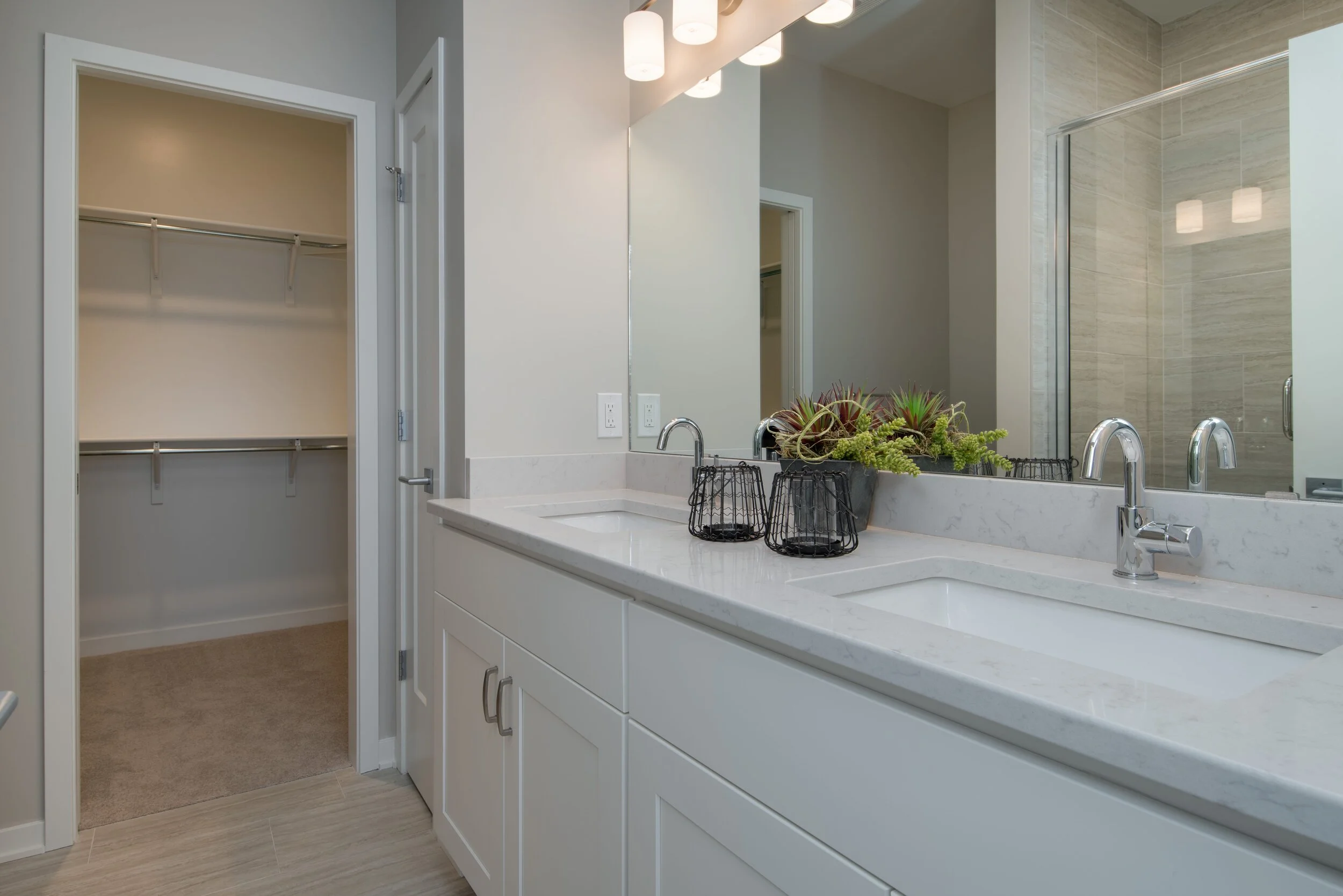 2 11 2019_TW-01-003_Diamond_Owners bath_ceramic tile floors_painted cabinets_cultured marble countertops_dual vanity_walk in closet-min.jpg