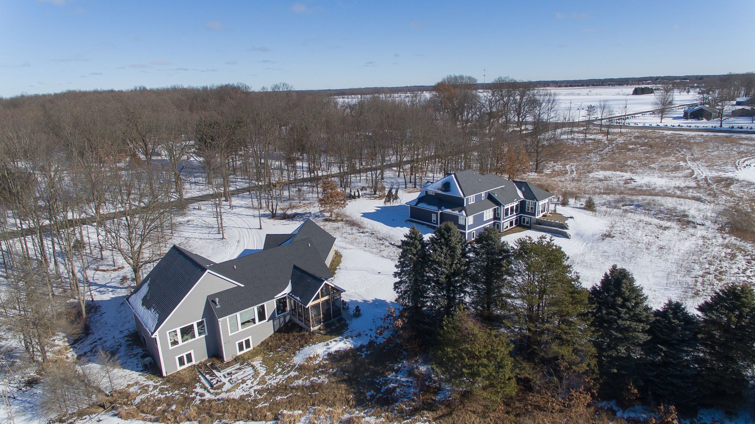 Marshes_Winter_Drone shot_Two home exteriors.jpg