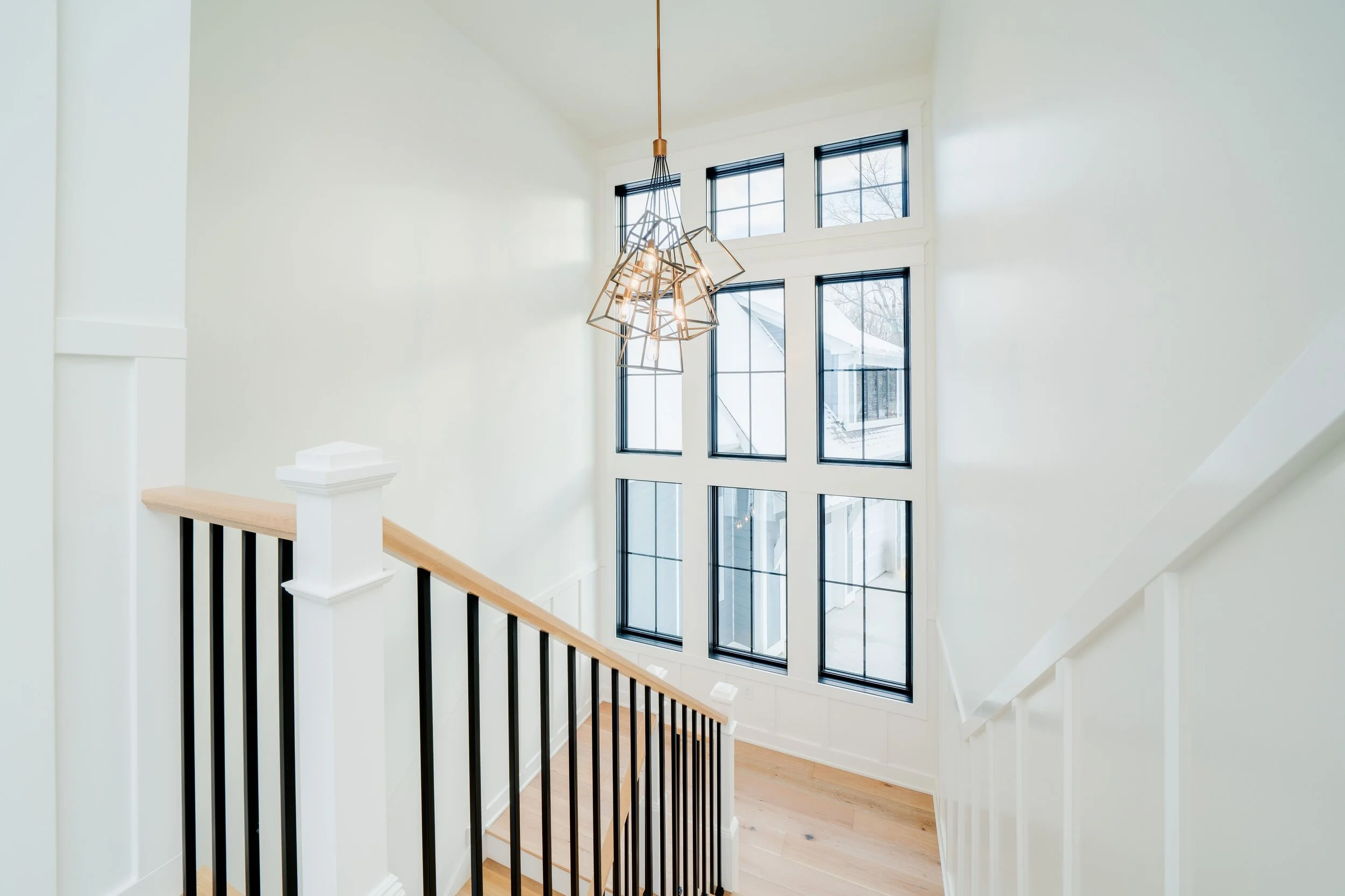 CUS-19-088_Custom_Upper level stairs_View to lake.jpg