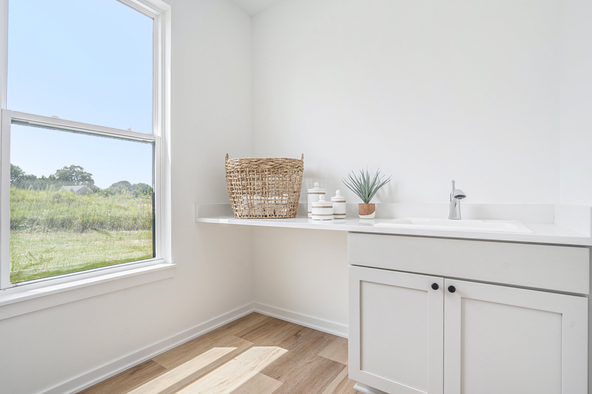 TS-01-35 Ellis Laundry Room with cabinet and shelf.jpg