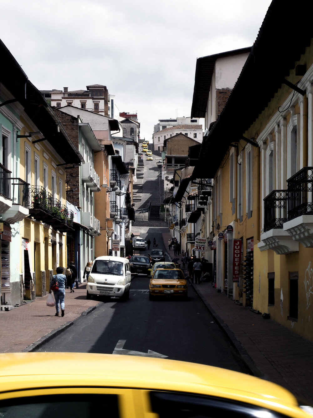  eight yellow cabs, more yellow facades 