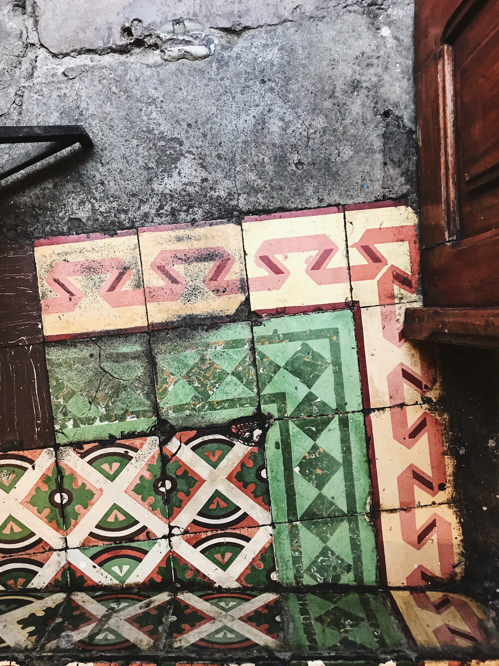  colourful tiles in entranceways 