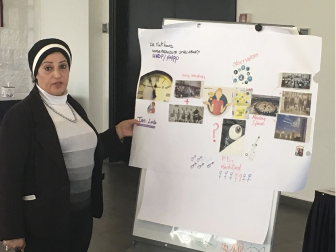 UNDP project manager Maha Abusamra presenting the Al Fakhoora project