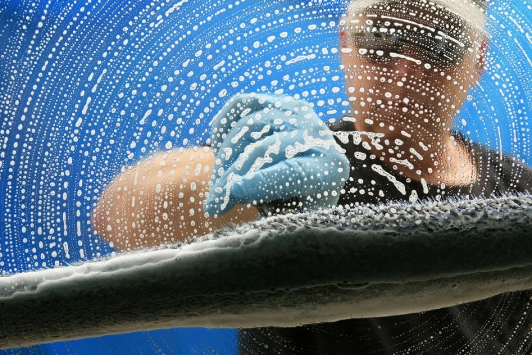 bigstock-a-professional-window-cleaner--25927232.jpg