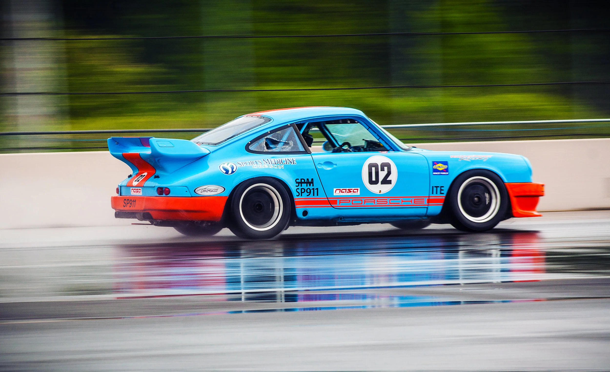 Rainy Track days at Portland International Raceway aren’t overall rare. Not only do days like this make for extra excitement, but they definitely make for a dynamic image! ©2006-2018 ShutterMeShort Photography. Images may not be copied, printed or otherwise disseminated without express written permission of ShutterMeShort Photography or its agents.