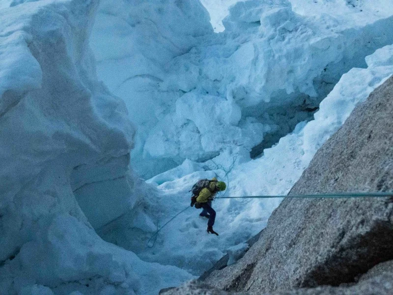 The exciting final rappel over the bergschrund.