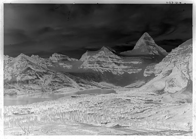 An example of a glass plate negative. This plate was taken in 1913 by A.O. Wheeler and crew as part of the Inter-Provincial Boundary Survey between Alberta and British Columbia. It was taken on a ridge below Nub Peak and looks over Magog Lake to the Mt. Assiniboine massif. Photo courtesy of Library and Archives Canada / Bibliothèque et Archives (LAC/BAC) Canada and the Mountain Legacy Project.