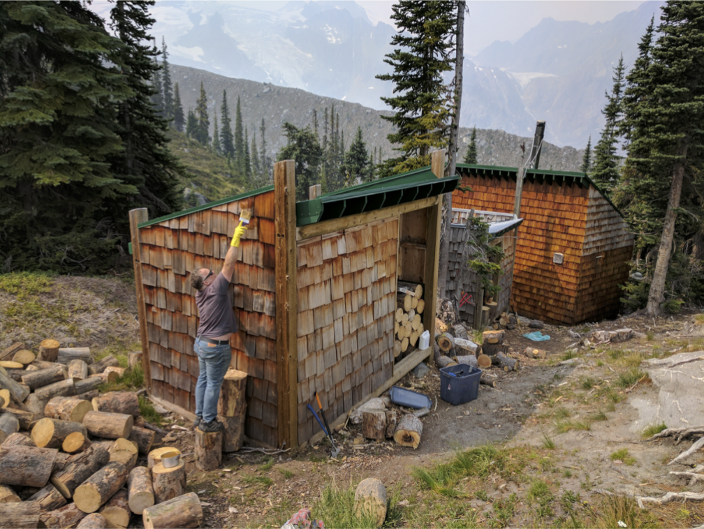 Steve staining the woodshed.