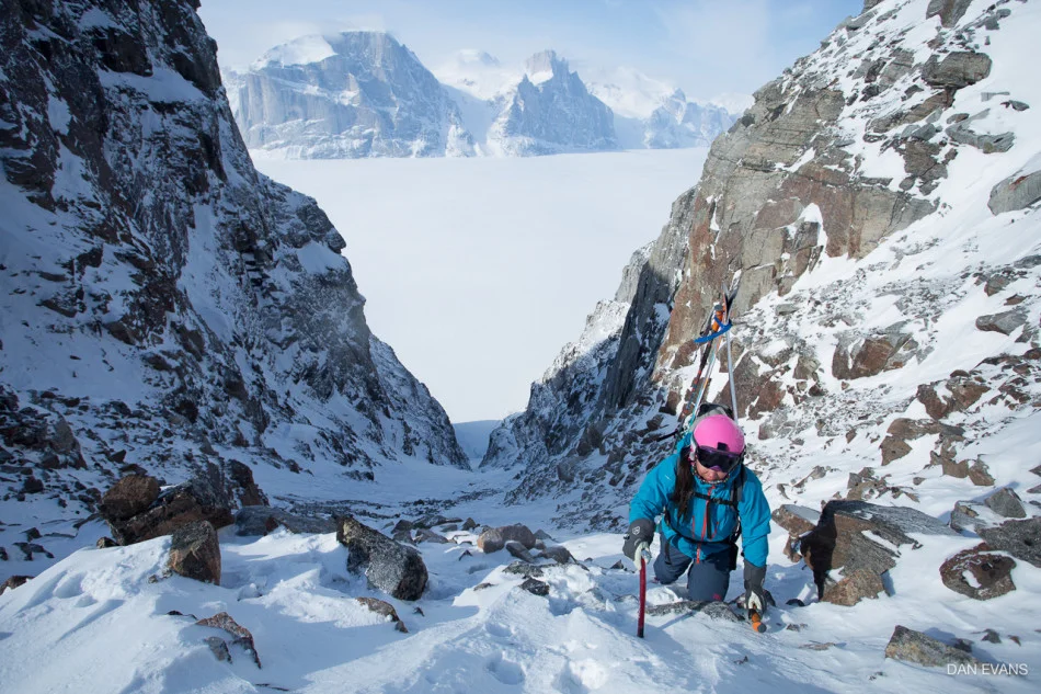 Topping out of Escort Couloir with Great Cross Pillar beyond the fjord. Photo by Dan Evans.