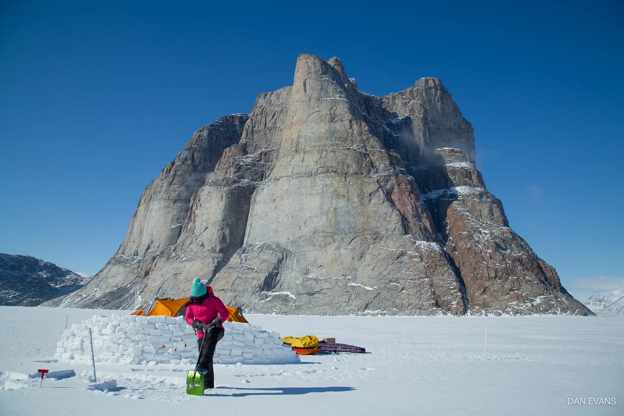 Staying warm and building a wind break at our fourth camp by the Walker Citadel. Photo by Dan Evans.