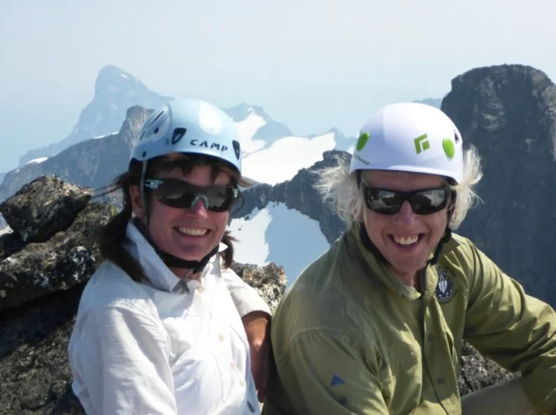 Alison Dakin and Roger Laurilla at summit of Cougar Pk. Frenchman Cap is in the background in a bit of smoke.