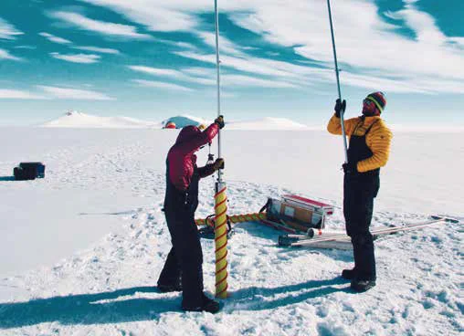 Drilling for ice core samples.Photo: Alison Criscitiello.