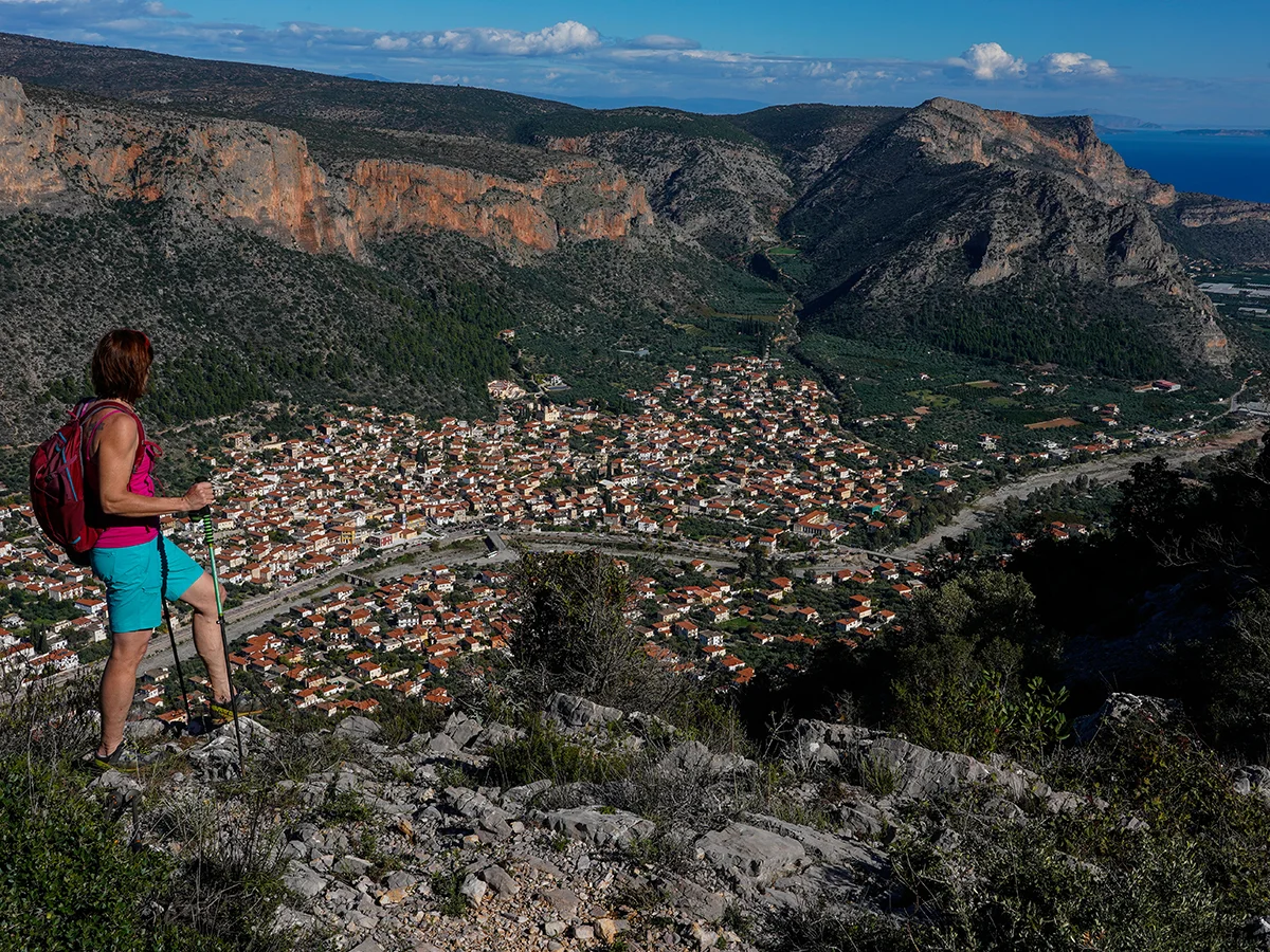 Nancy overlooks the town of Leonidio from the ‘Merohoro-Profitis Helias” hike. Photo by Ralf Dujmovits.