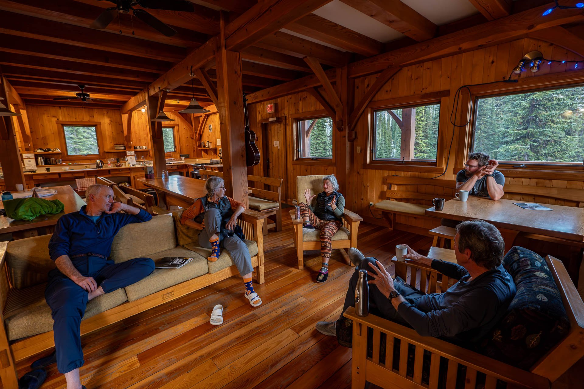  Volunteers enjoy the cabin on its 20th anniversary. 