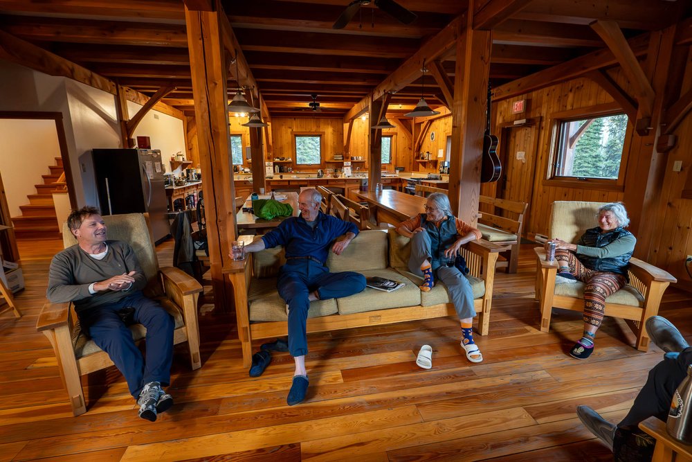  Volunteers enjoy the cabin on its 20th anniversary. 